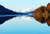 A beautiful February view from Kinlochlaggan looking West along a partly frozen Loch Laggan, towards the Grey Corries. Stob Ban and Stob Choire Claurigh are the mountains on the horizon. The Ardveriki