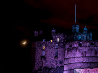 Edinburgh Castle and a crescent moon