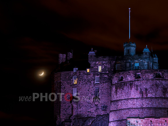 Edinburgh Castle and a crescent moon