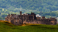 Edinburgh Castle hides behind Salisbury Crags