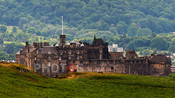 Edinburgh Castle hides behind Salisbury Crags